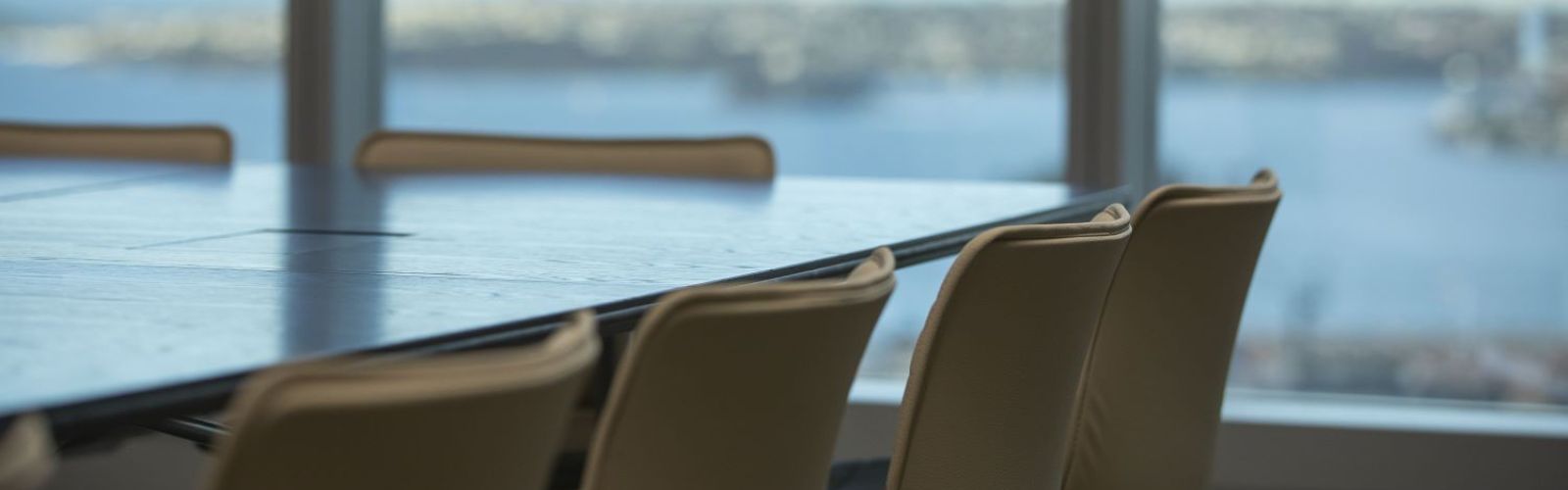 Boardroom chairs in front of window 2