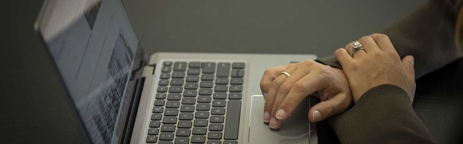 Woman typing on laptop
