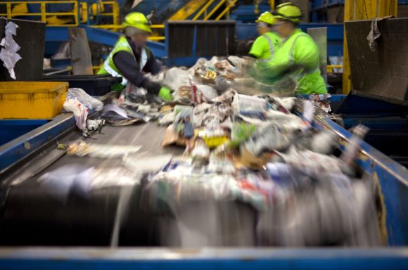 Workers sorting waste