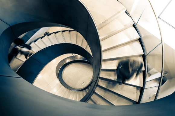 Businessman walking down stairs
