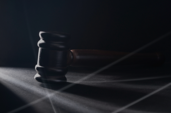 Gavel on black background