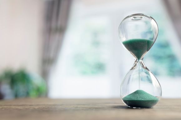 Hourglass on blurred background 