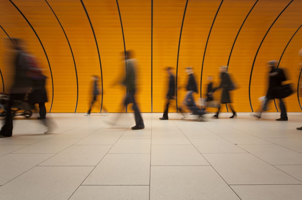 People walking in tunnel
