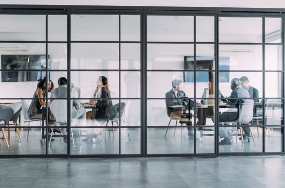 Group of business persons in business meeting