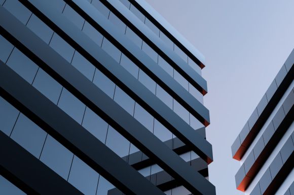 Two modern buildings with glass windows