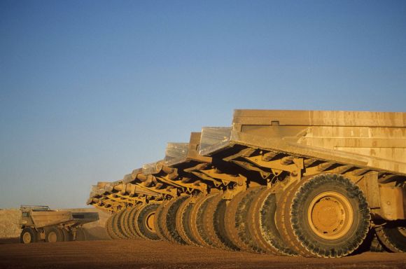 Ore hauling trucks in row