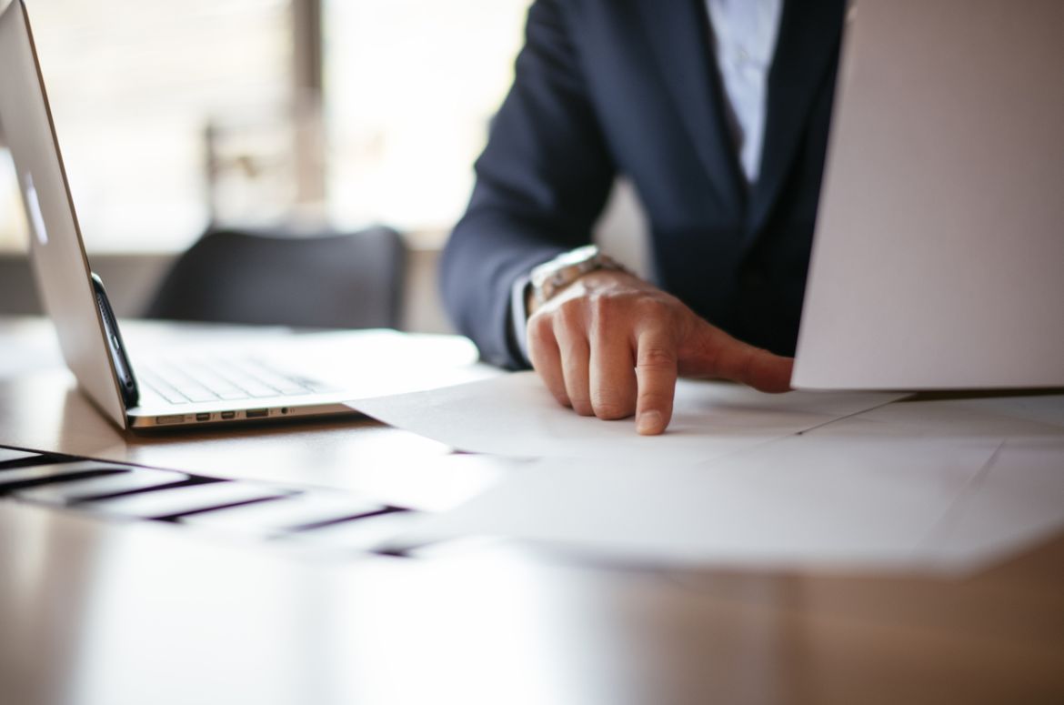 Businessman working in blue suit at the office