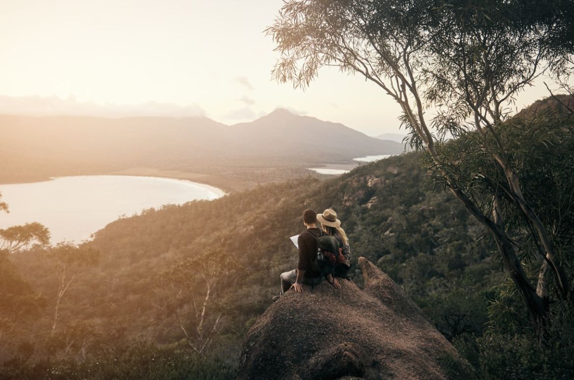 Backpackers holding a map