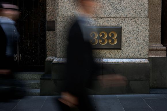 Blurred business man outside 333 Collins 2 medium