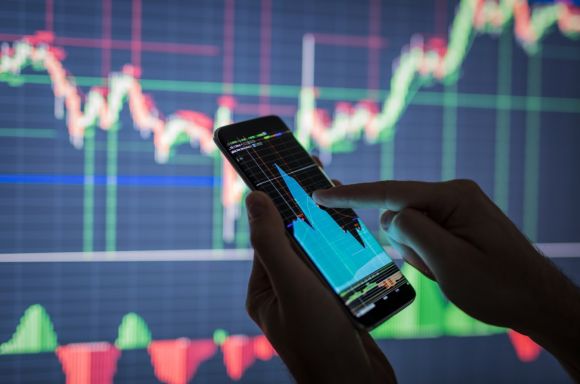 Businessman checking stock market data