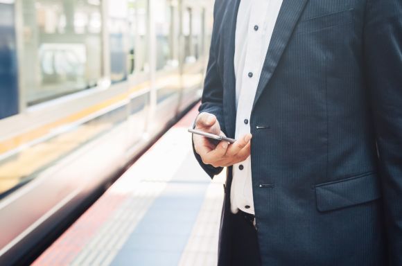Businessman waiting for the train