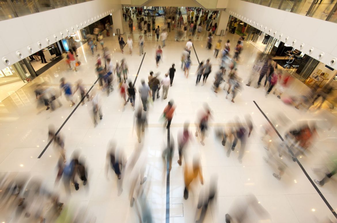 Busy shopping centre with blurred shoppers v2 Resampled
