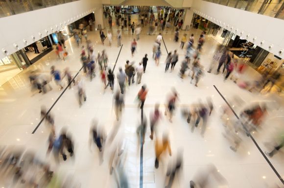 Busy shopping centre with blurred shoppers v2 Resampled