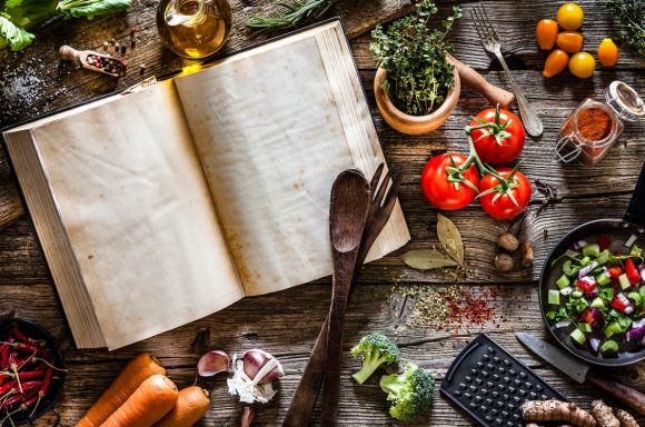 Cookbook with vegetables and spices