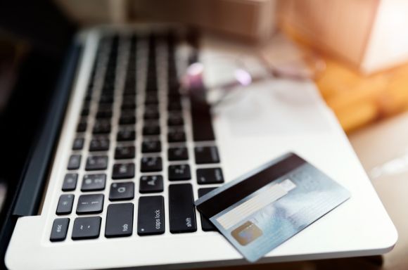 Credit card on laptop picture