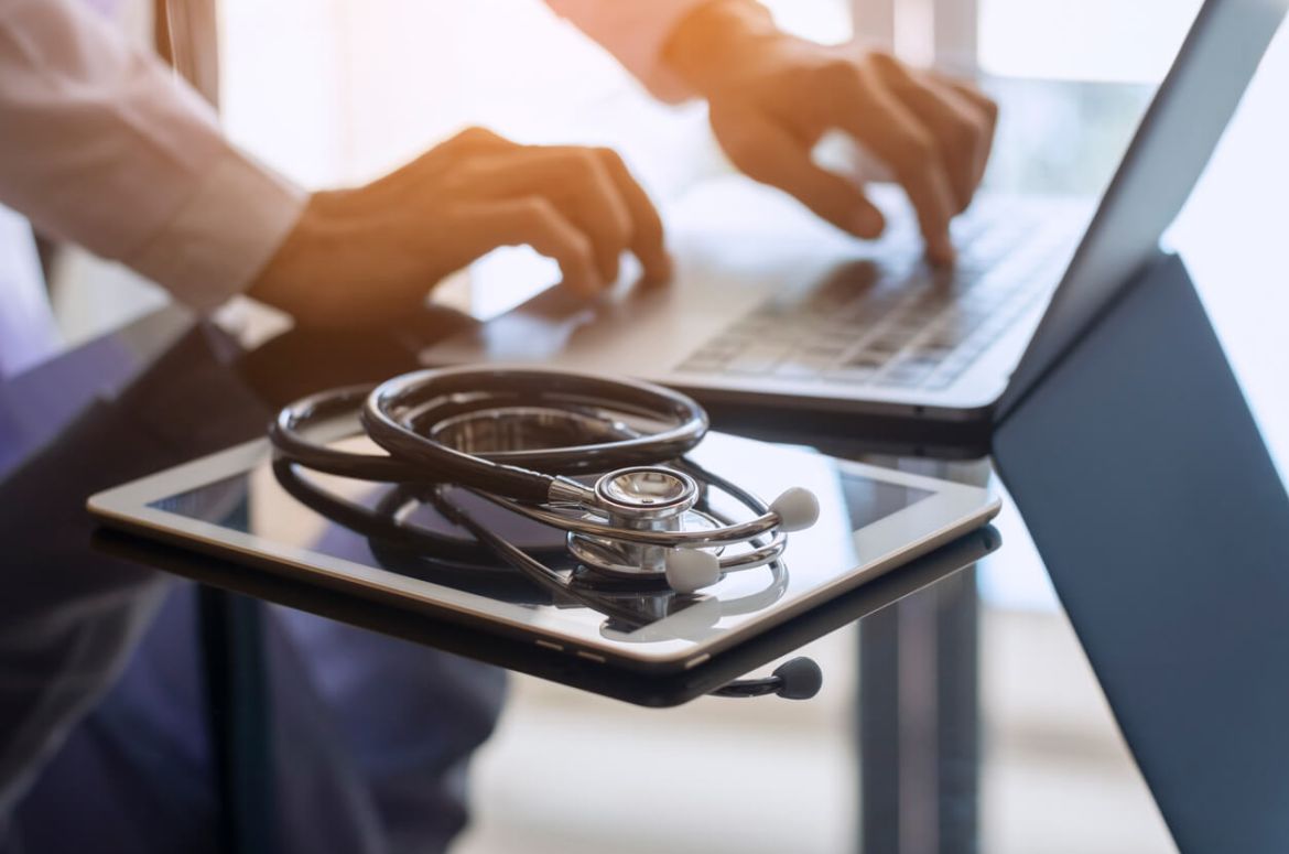 Doctor using computer v2