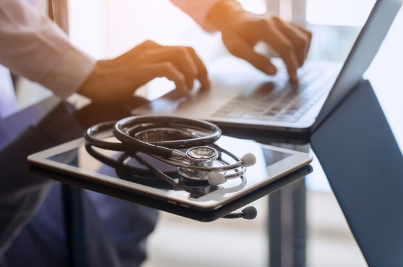 Doctor using computer v2
