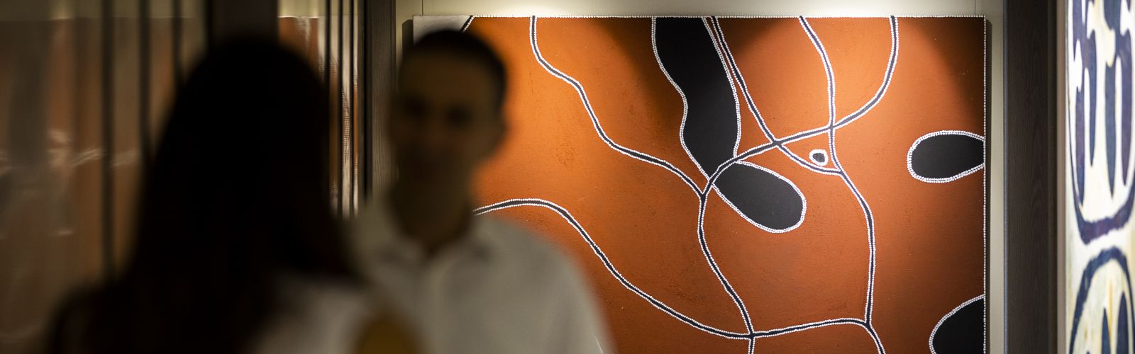 Paintings in Sydney office hallway 8