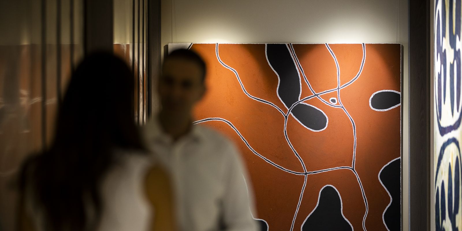 Paintings in Sydney office hallway 8