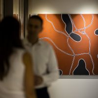 Paintings in Sydney office hallway 8