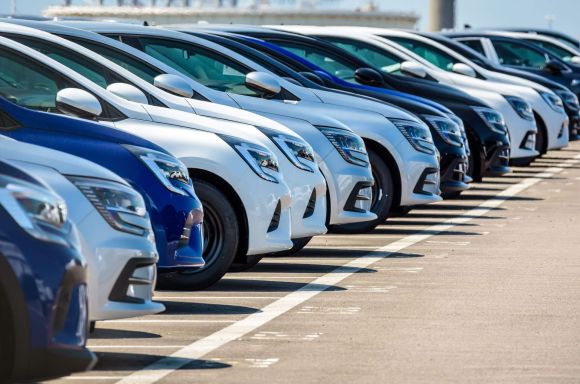 Brand new Renault cars lined up in a parking lot
