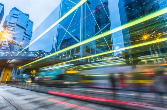 illuminated skyscrapers and light trails in hong kong picture id519887212