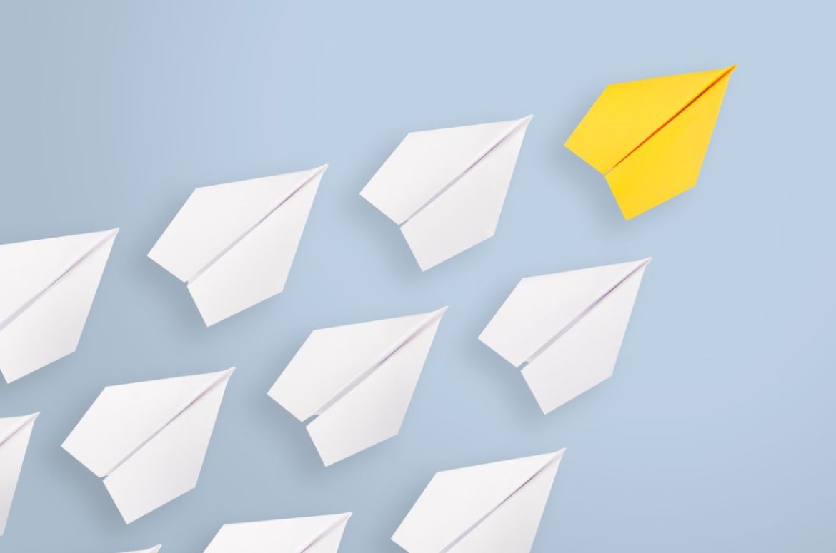 leadership concepts with yellow paper airplane leading among white picture id1133438274
