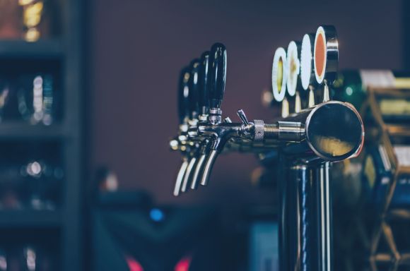 modern many beer taps in the beer bar picture id1065795062